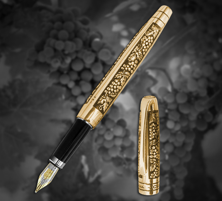 golden bronze pen with sculpted grape vine motif