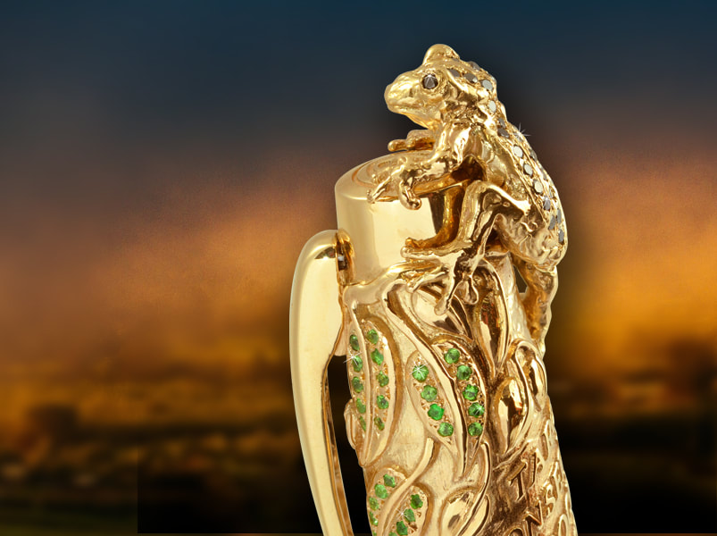 Luxury solid gold pen with sculptured endangered Australian set with black diamonds